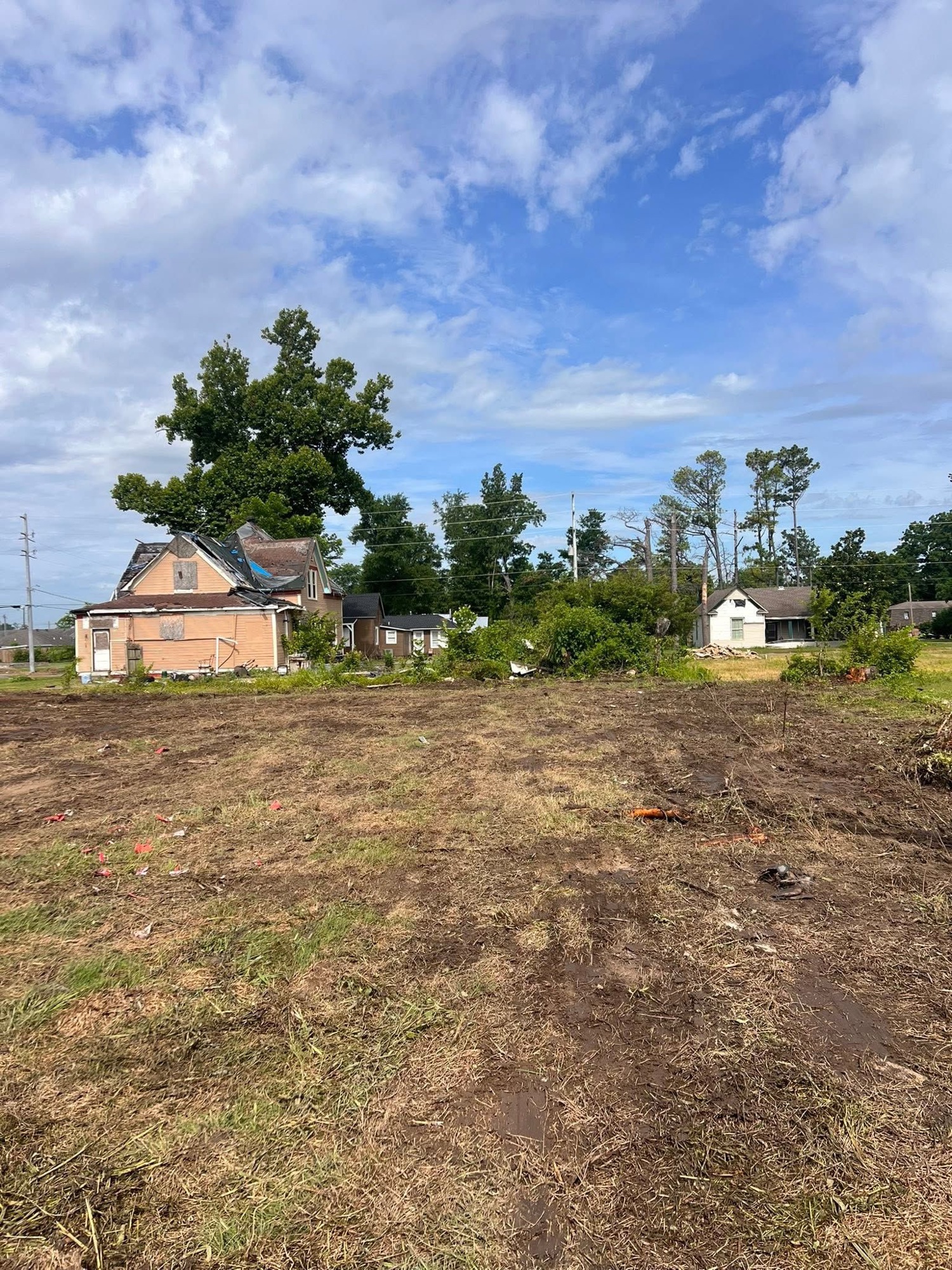 Same lot cleared and mowed flat, market-ready