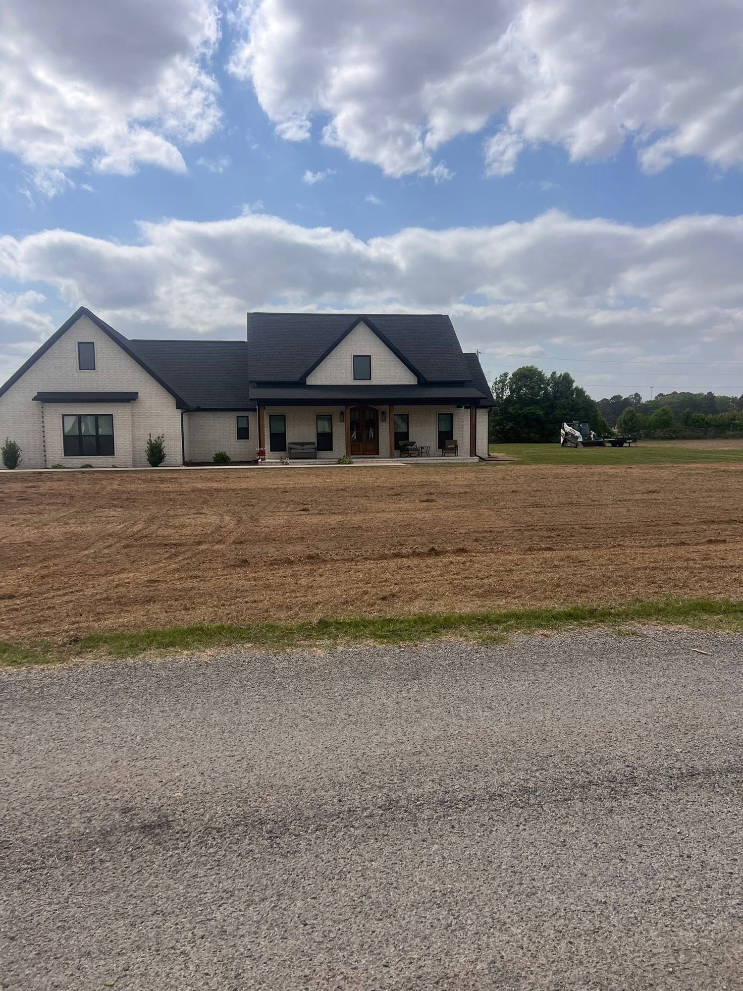 Freshly graded yard at a new-build custom home