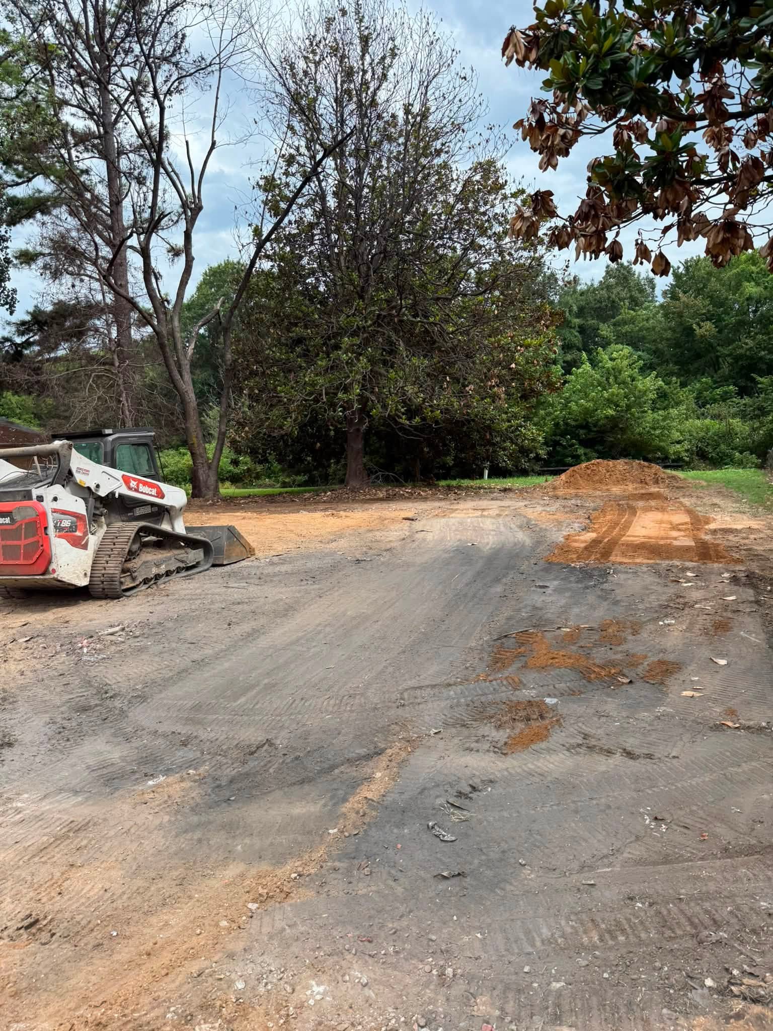 Same lot cleared to bare ground after demolition